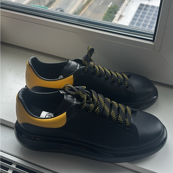 Alexander McQueen Black and Yellow Sneakers Sleek Design